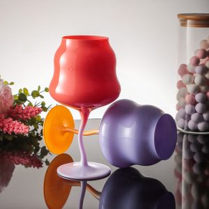 colorful wine glasses with unique shapes and bases