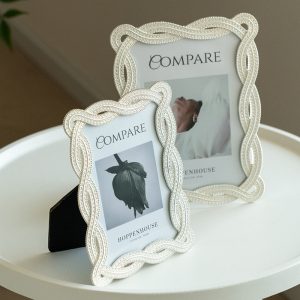White woven texture metal photo frame in a modern living room